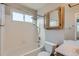 Full bathroom featuring tile shower and tub combo at 12144 Newport Dr, Brighton, CO 80602