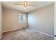Bedroom with neutral paint and carpet with ceiling fan at 12144 Newport Dr, Brighton, CO 80602