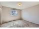 Bedroom with neutral paint and carpet and natural light at 12144 Newport Dr, Brighton, CO 80602