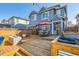 Backyard view of a spacious wooden deck, perfect for outdoor living at 1145 S Logan St, Denver, CO 80210