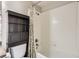 Bathroom featuring a tub and shower combination with floral shower curtain at 1145 S Logan St, Denver, CO 80210