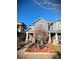 Charming home with mature landscaping in the front yard at 1145 S Logan St, Denver, CO 80210