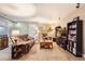 Comfortable living room with plush seating, shelving, and a cozy atmosphere at 1145 S Logan St, Denver, CO 80210