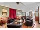 Basement with classic decor, offering seating around a decorative round table at 9606 Whitecliff Pl, Highlands Ranch, CO 80129
