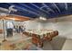 Partially finished basement with exposed ceiling, workout equipment, and potential for flexible use at 13235 Clermont Cir, Thornton, CO 80241