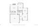 Detailed first floor plan showcasing kitchen, dining, living, laundry rooms, garage, and backyard at 13235 Clermont Cir, Thornton, CO 80241