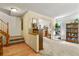 View of the split level living room and staircase in this home at 13235 Clermont Cir, Thornton, CO 80241