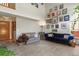 Bright living room with high ceilings, comfortable couches, and picture-lined walls at 13235 Clermont Cir, Thornton, CO 80241