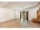 Bright living room with modern flooring, natural light, and access to outdoor space at 1545 S Ouray Cir # B, Aurora, CO 80017