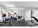 Well-equipped basement gym with various exercise machines and fitness equipment at 2560 Blake # 101, Denver, CO 80205