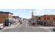 Charming street with a mix of historic buildings, showcasing a vibrant and walkable urban environment at 2560 Blake # 101, Denver, CO 80205