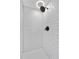 Modern shower showcasing white subway tile and contemporary fixtures at 701 Harlan St # E53, Lakewood, CO 80214
