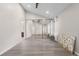 Large bedroom with mirrored closets, ceiling fan, and bright, natural light at 701 Harlan St # E53, Lakewood, CO 80214