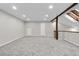 Spacious carpeted loft with multiple windows, and cozy architectural features, ideal for a Gathering room at 701 Harlan St # E53, Lakewood, CO 80214