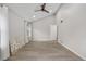 Spacious main bedroom with a vaulted ceiling, ample natural light, and neutral decor at 701 Harlan St # E53, Lakewood, CO 80214