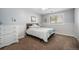 Cozy bedroom features neutral paint and a large window allowing for plenty of natural light at 20 W Ranch Trl, Morrison, CO 80465