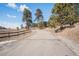 Scenic driveway leading to a private home with natural surroundings at 20 W Ranch Trl, Morrison, CO 80465