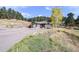 Charming ranch home with a two-car garage and a welcoming front porch at 20 W Ranch Trl, Morrison, CO 80465
