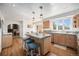 Modern kitchen with granite countertops, stainless appliances, and breakfast bar at 20 W Ranch Trl, Morrison, CO 80465