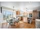 Bright kitchen featuring an island, stainless steel appliances, and a breakfast nook with a view at 20 W Ranch Trl, Morrison, CO 80465