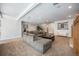 Spacious living room with plush carpet, large sectional, and plenty of space for entertaining at 20 W Ranch Trl, Morrison, CO 80465
