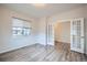 Inviting bedroom with ample natural light, offering flexible space with adjoining room access at 16881 Roaming Elk Dr, Monument, CO 80132