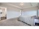 Spacious primary bedroom with tray ceiling, neutral colors, and ample natural light at 16881 Roaming Elk Dr, Monument, CO 80132