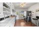 Efficient kitchen features stainless steel appliances, ample cabinet space, and bright natural light at 2616 Utica St, Denver, CO 80212