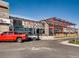 Tamale Kitchen featuring modern architecture, outdoor patio, and ample parking spaces for guests at 2616 Utica St, Denver, CO 80212