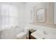 Clean bathroom with toilet, sink, and shower/tub combination at 403 W 3Rd Ave, Denver, CO 80223