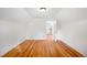 Spacious bedroom with hardwood floors and access to another room at 403 W 3Rd Ave, Denver, CO 80223