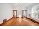 Spacious dining room with hardwood floors and access to kitchen at 403 W 3Rd Ave, Denver, CO 80223
