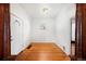 Bright entryway with hardwood floors and classic columns at 403 W 3Rd Ave, Denver, CO 80223