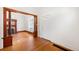 Spacious entryway, hardwood floors, and view to living room at 403 W 3Rd Ave, Denver, CO 80223