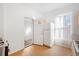 Kitchen with wood cabinets, gas range, and exterior access at 403 W 3Rd Ave, Denver, CO 80223