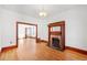 Living room with hardwood floors, fireplace and large windows at 403 W 3Rd Ave, Denver, CO 80223