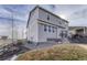 Two-story home with neutral siding and a well-maintained lawn at 14021 Scarlet Sage St, Parker, CO 80134