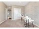 Home office featuring a white desk, and built-in shelving at 14021 Scarlet Sage St, Parker, CO 80134