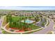 Aerial view of a community with a pool, park, and green spaces, offering a serene and active lifestyle at 14278 Greenfield Loop, Parker, CO 80134