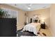 Cozy bedroom with natural light, a plush rug, and unique decor creating a comfortable and stylish retreat at 14278 Greenfield Loop, Parker, CO 80134