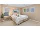 Bedroom with lots of natural light, neutral walls, and cozy decor, creating a serene and inviting atmosphere at 14278 Greenfield Loop, Parker, CO 80134
