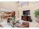 Inviting living room with views to the kitchen and second-floor landing, featuring comfortable seating at 14278 Greenfield Loop, Parker, CO 80134