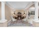 Elegant living room featuring neutral walls, modern furnishings, and natural light from large windows at 14278 Greenfield Loop, Parker, CO 80134