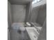 Clean and modern bathroom with tiled shower over tub and sleek vanity at 4720 Thompson Ct, Denver, CO 80216