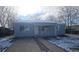 Lovely single-story home with welcoming porch and well-manicured front yard at 4720 Thompson Ct, Denver, CO 80216