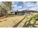 Large backyard with covered patio, perfect for entertaining at 55 Dexter St, Denver, CO 80220