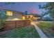 A cozy patio area and fenced yard create a private outdoor living space at 55 Dexter St, Denver, CO 80220
