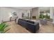 Bright living room with stone fireplace, modern decor, and abundant natural light at 55 Dexter St, Denver, CO 80220