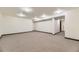 Spacious basement with neutral carpet and bright recessed lighting at 17692 E Brown Cir, Aurora, CO 80013