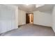Bedroom featuring double door closet and doorway to other rooms at 17692 E Brown Cir, Aurora, CO 80013